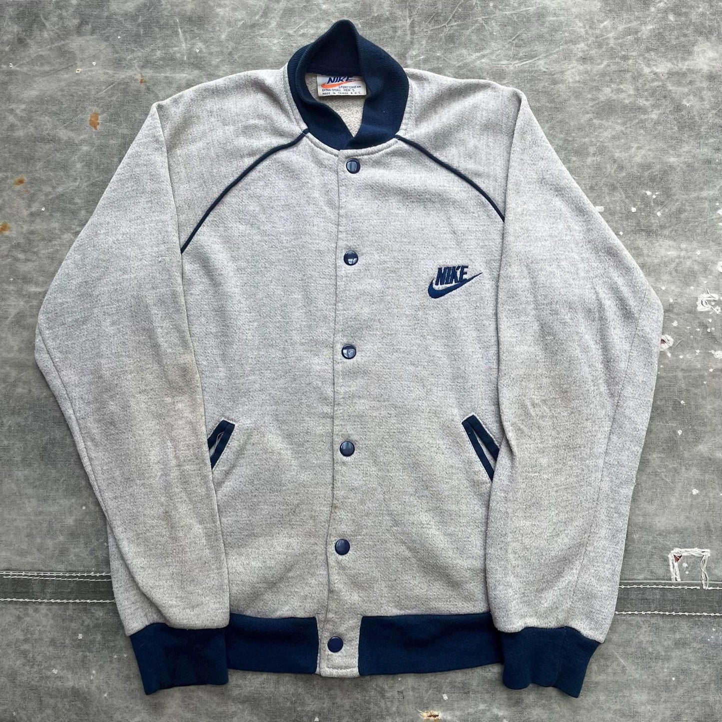 Vintage 1970s Nike Sportswear Snap Button Jacket Graphic Tee – Bold Style · Trending Graphic Apparel