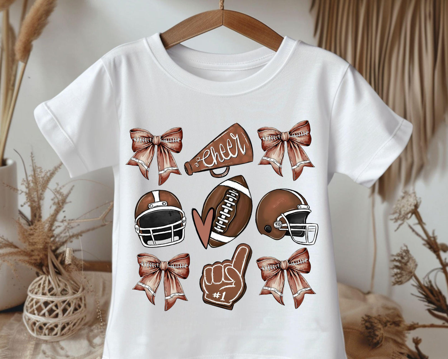 Kids Football Shirt with Coquette Bows Cute Girls Football Tee Football Season Top Toddler Football T Shirt Youth Football Shirt Graphic Tee – Cozy Vibes · Trending Graphic Apparel