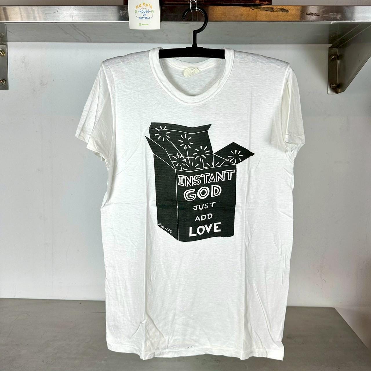 Vintage 1975 Instant God Just Add Love Religion Humor T shirt Vintage Art Tees Art Tshirts Pop Art tees Vintage Tshirts Graphic Tee – Bold Style · Perfect For Daily Wear
