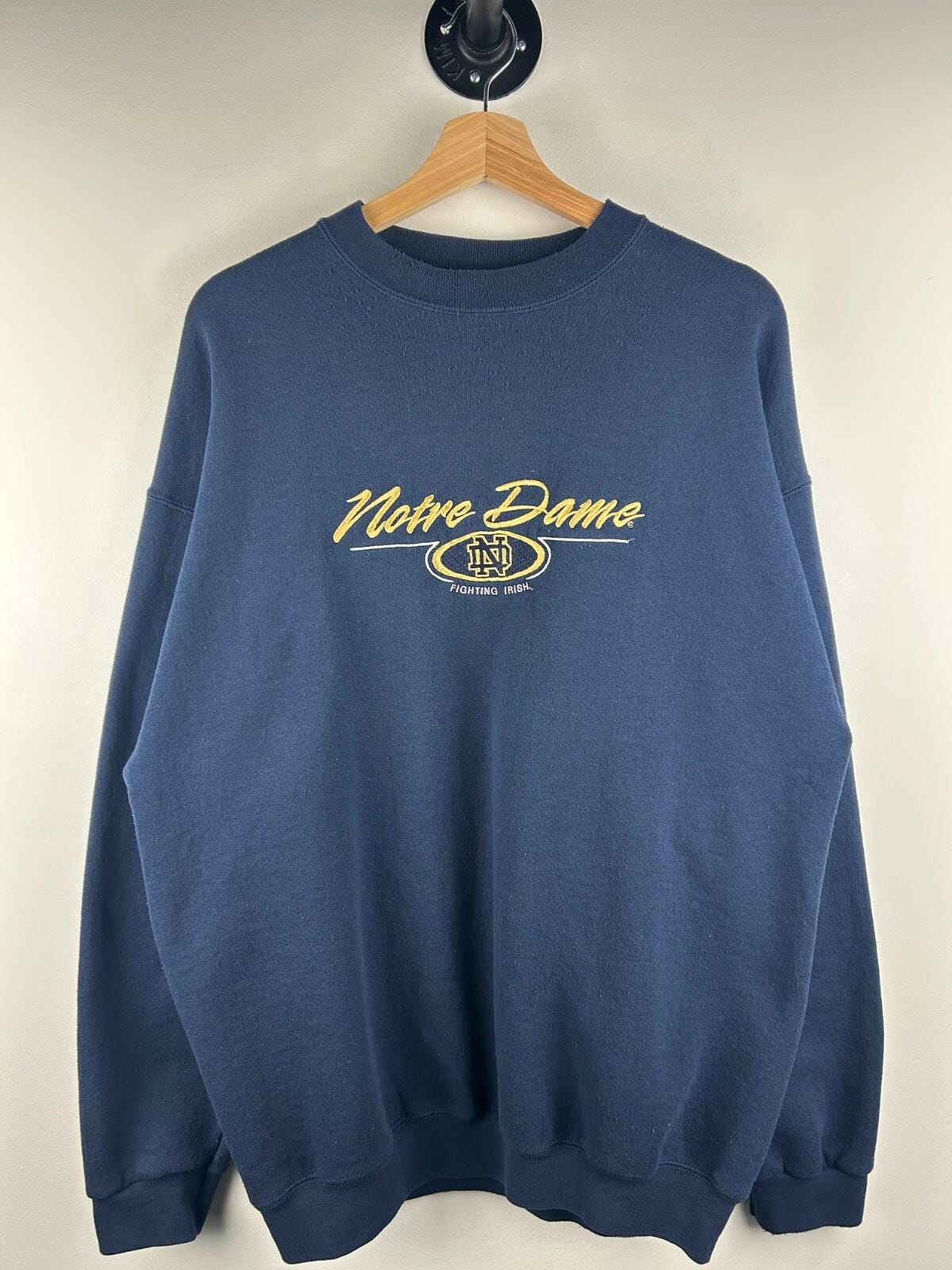 Vintage 90s Notre Dame Fighting Irish Football Embroidered Navy Crewneck Size L Graphic Tee – Easygoing Wear · Trending Graphic Apparel