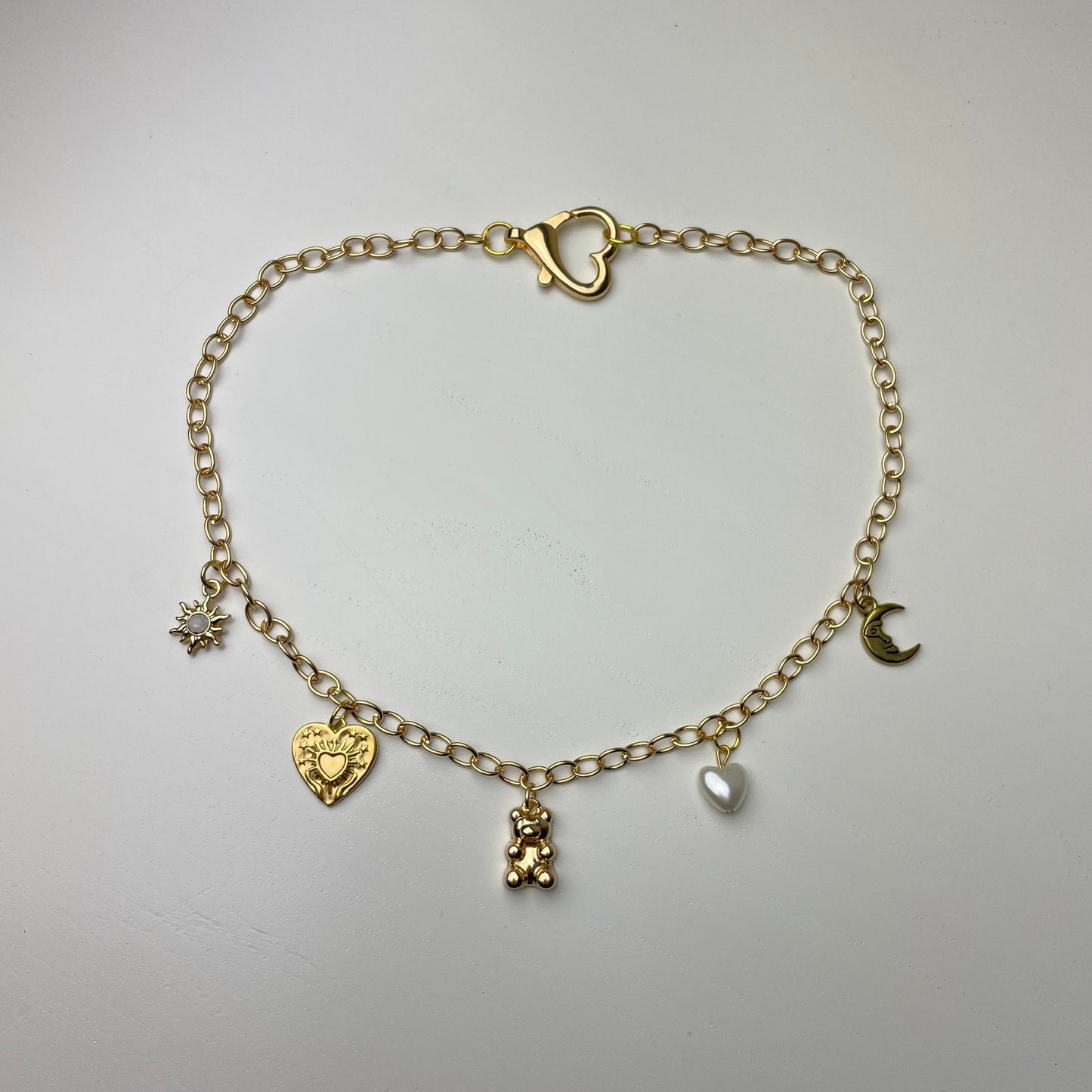 Dainty Gold Charm Necklace Graphic Tee – Warm & Stylish · Top Pick For Any Outfit