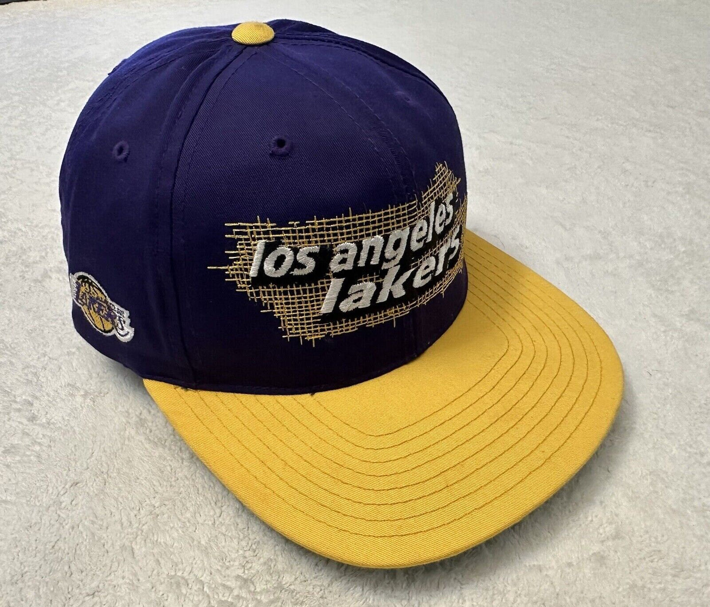 Vintage 1990s 90s Los Angeles Lakers NBA Basketball Annco Snapback Hat Purple Graphic Tee – Premium Graphic · Trending Graphic Apparel