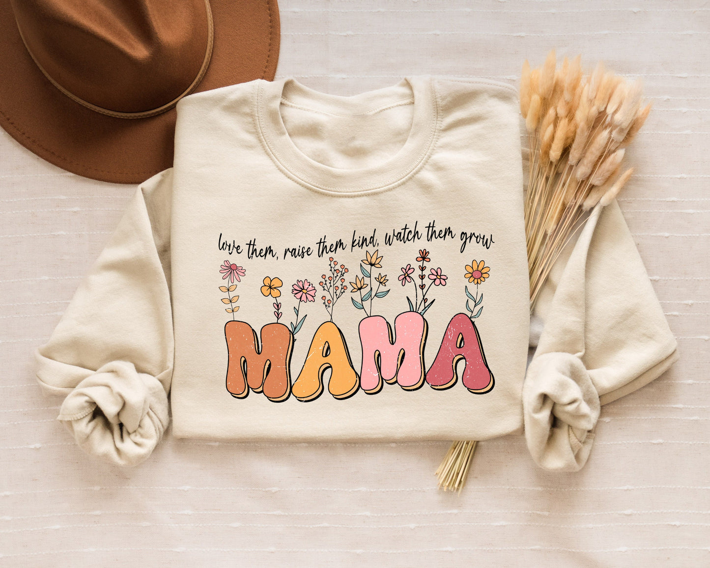 Love Them Raise Them Kind Watch Them Grow Floral Mama Sweatshirt Wildflowers Mama Shirt Spring Mama Shirt Mother39s Day Gift New Mom Gift Sweatshirt – Premium Graphic · Great Gift For Fans