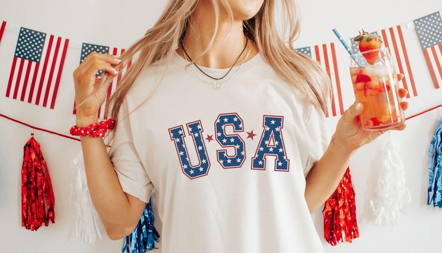 Retro USA Graphic Tee 4th of July Shirt American Graphic Tee Retro USA Shirt Cute Oversized Tee Gift for Women 39merica ShirtUSA Tee Graphic Tee – Premium Graphic · Trending Graphic Apparel