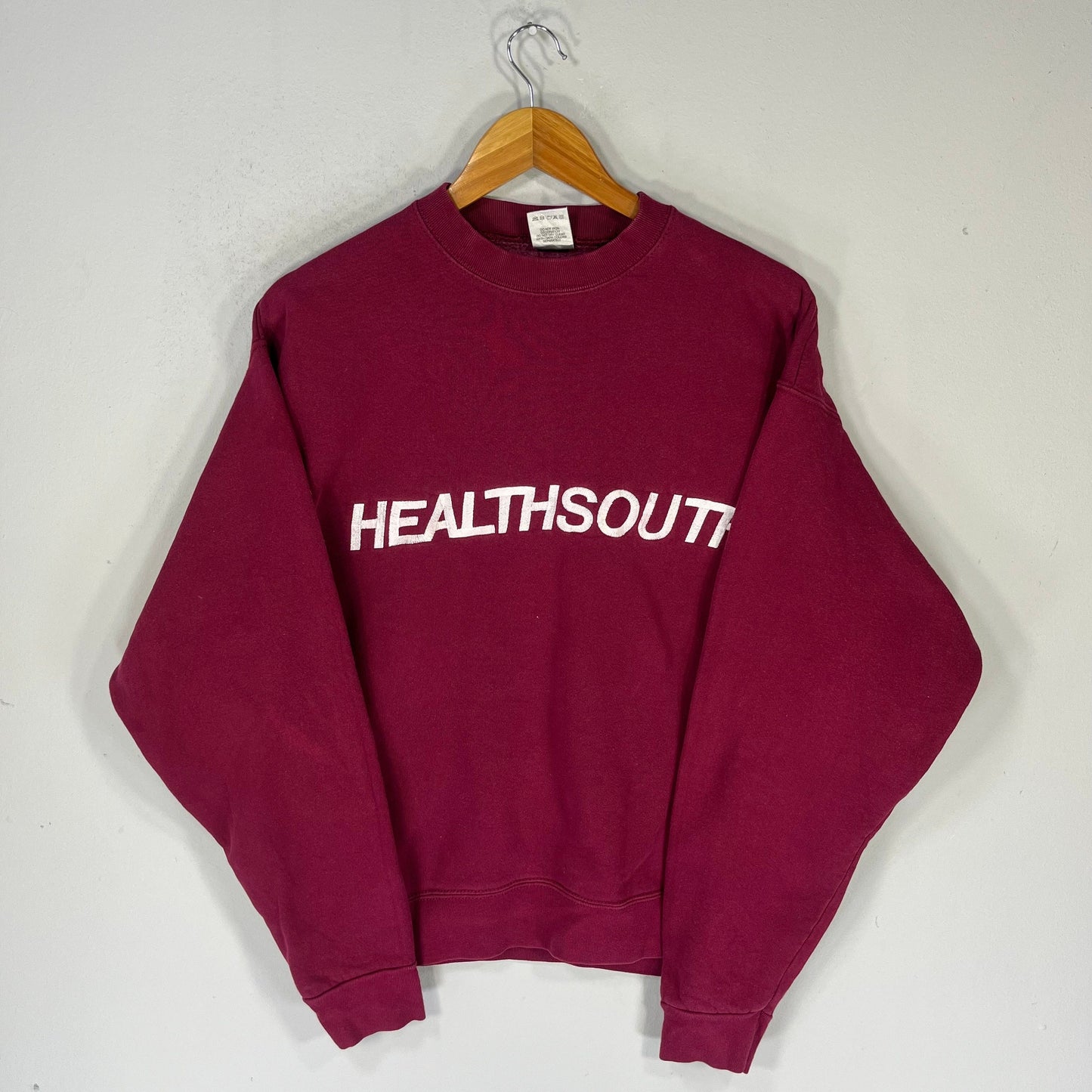 Vintage Fruit Of The Loom Tag HealthSouth Spellout BigLogo Embroidered Sweatshirt Crewneck Sweater Healthsouth Colour Maroon Size Large Sweatshirt – Soft Feel · Trending Graphic Apparel