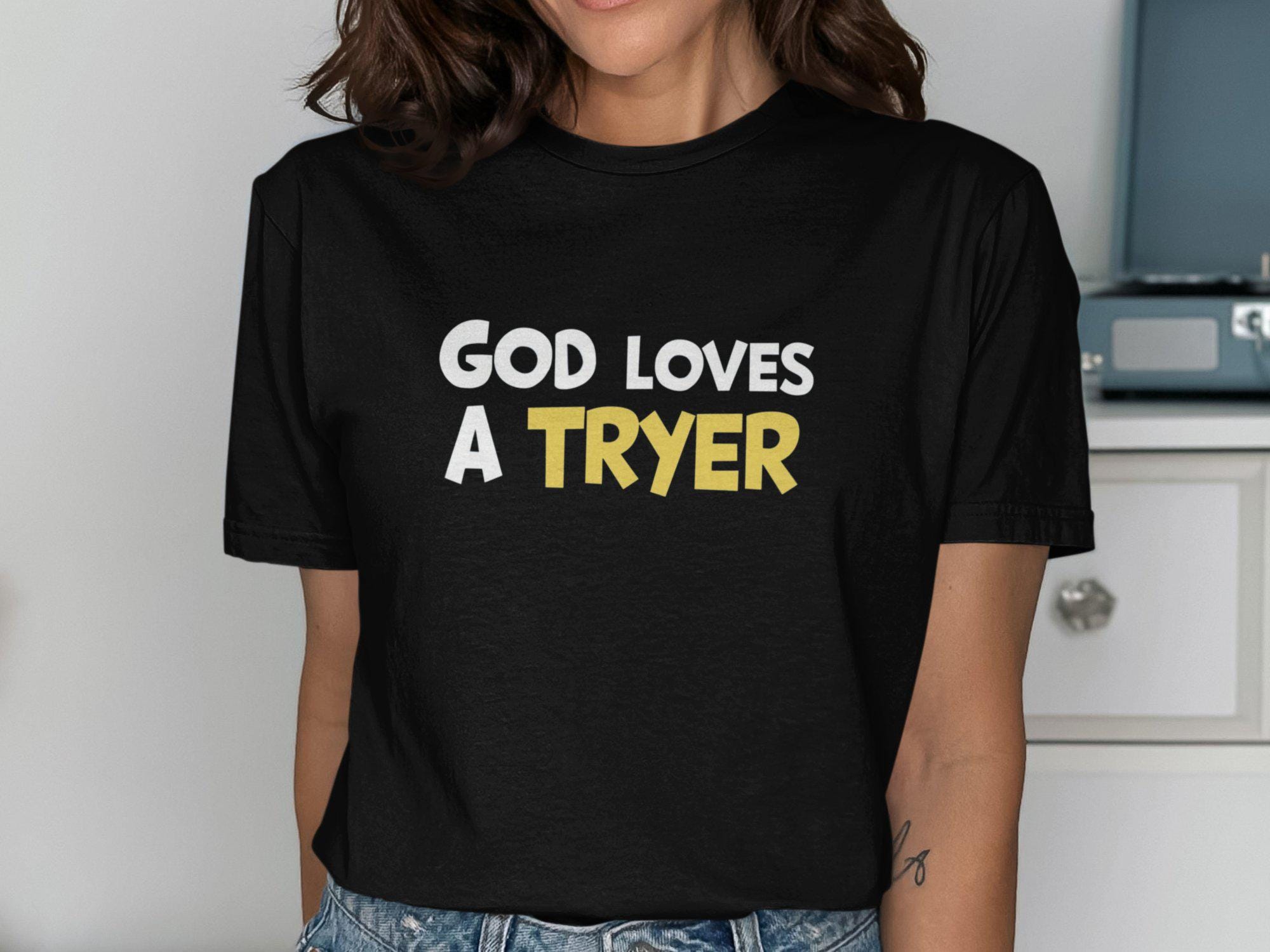 God Loves A Tryer T Shirt Motivational Quote Tee Inspirational Casual Shirt Positive Vibes Uplifting Message Top Gift for Friends Graphic Tee – Premium Graphic · Must-Have Style