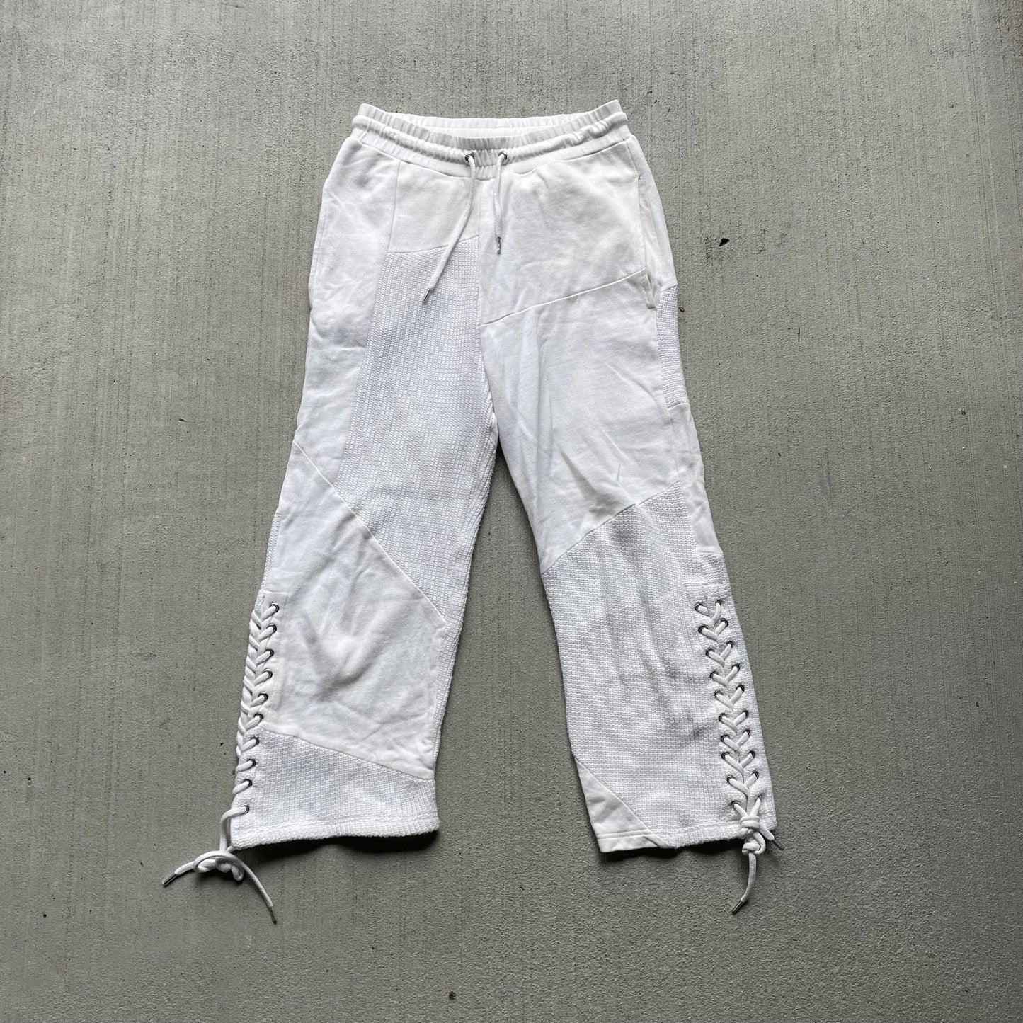 MCQ Alexander McQueen white cropped sweatpants Graphic Tee – Aesthetic Look · High-Quality Print