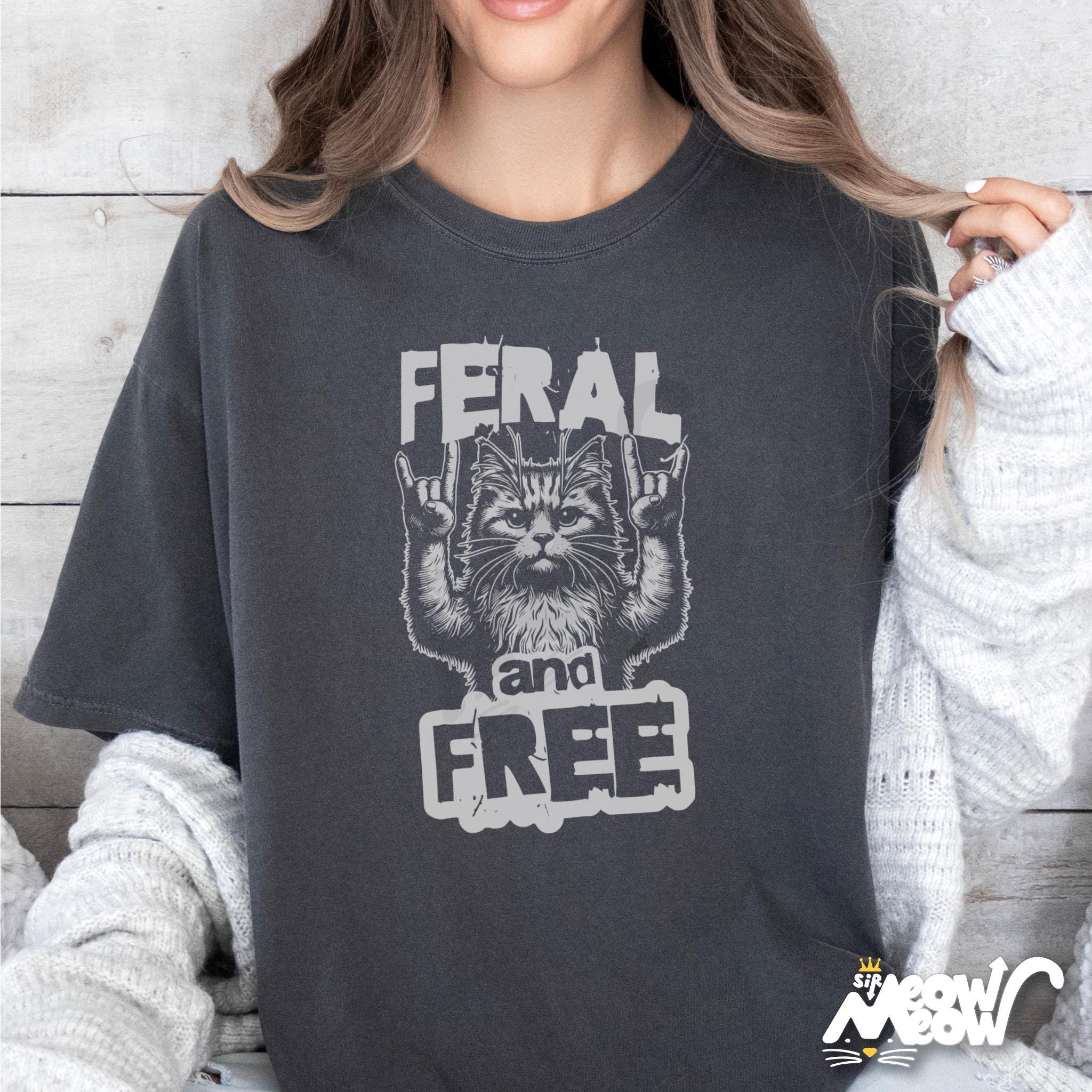 Feral and Free Cat Shirt Funny Rock Cat T Shirt Metal Cat Lover Tee Wild Cat Graphic Shirt Feral Cat Gift Idea Graphic Tee – Premium Graphic · Great Gift For Fans
